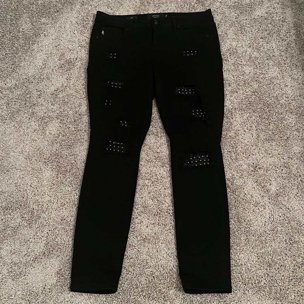 Torrid premium black jeans with leather studded cut outs